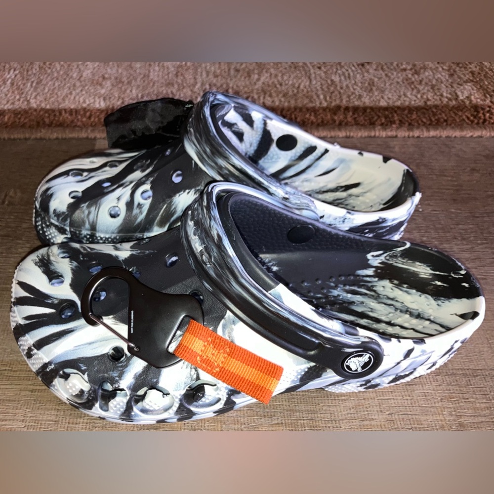 CROCS Black and White Flats with Orange Accent